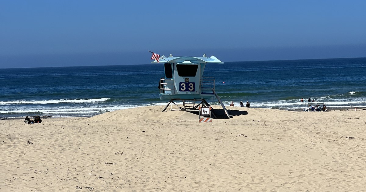 Lifeguard tower on the wide sandy beach along the Five Cities coastline in San Luis Obispo County, California