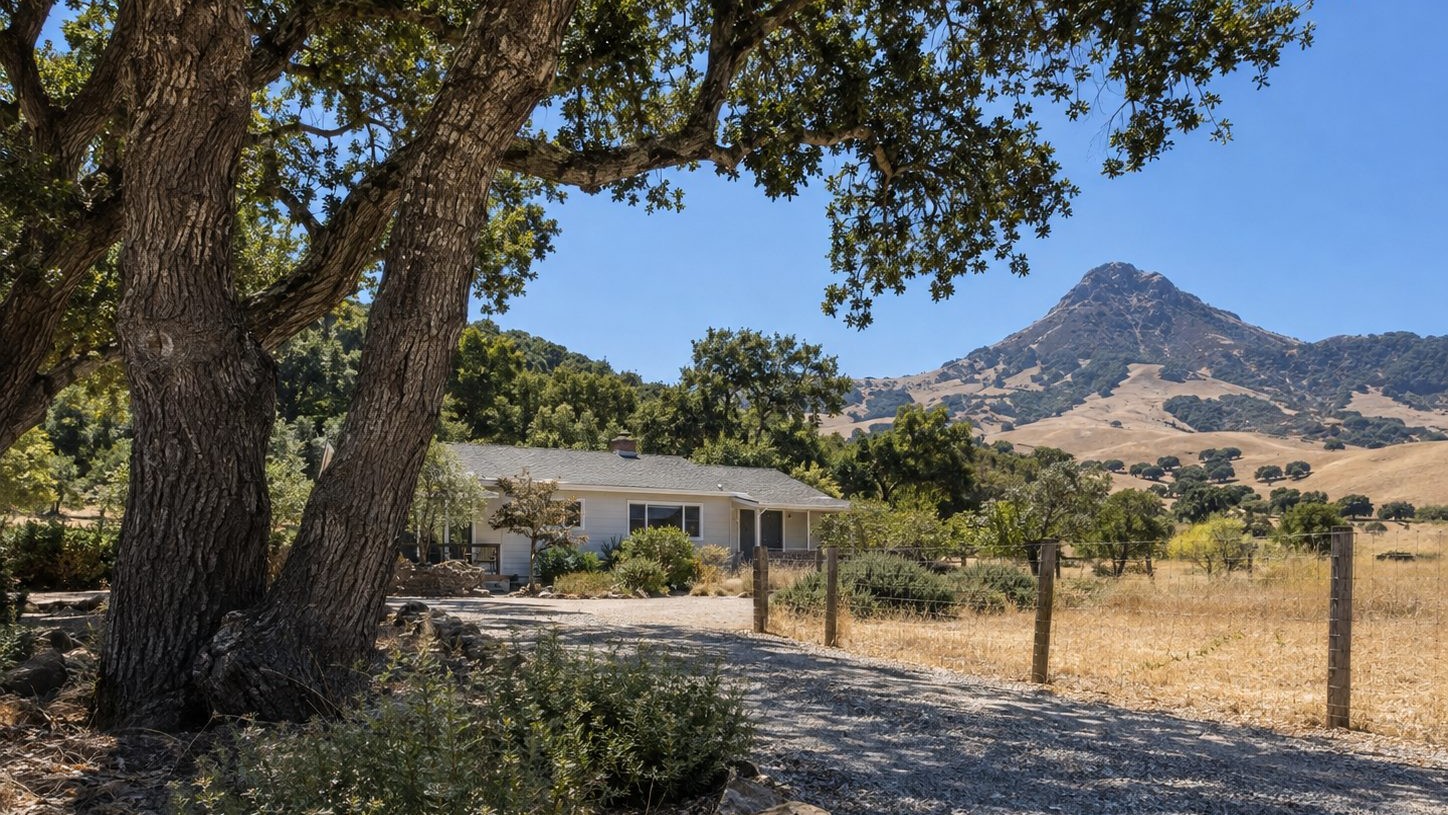 Rural home with a well on oak covered acreage below a volcanic peak in San Luis Obispo County